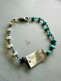Image 4 of turquoise and opal charm bracelet . be the light quote bracelet