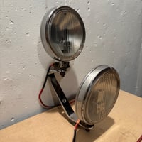 Image 1 of Vintage Wallfrin 74 Dual Round Headlamps w/ Chrome Bracket