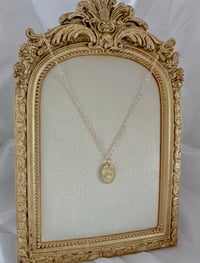 Image 2 of Gold oval shell charm with pearl
