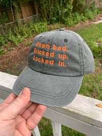 Image 2 of 'Down Bad. Bricked Up. Locked In' Hats