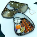 Vivid Orange & Black Haunted Mushie Cottage Suncatcher