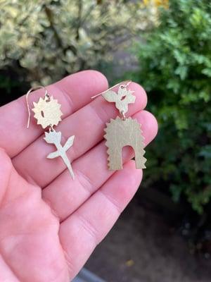 Flower, sun, arch and butterfly earrings in brass