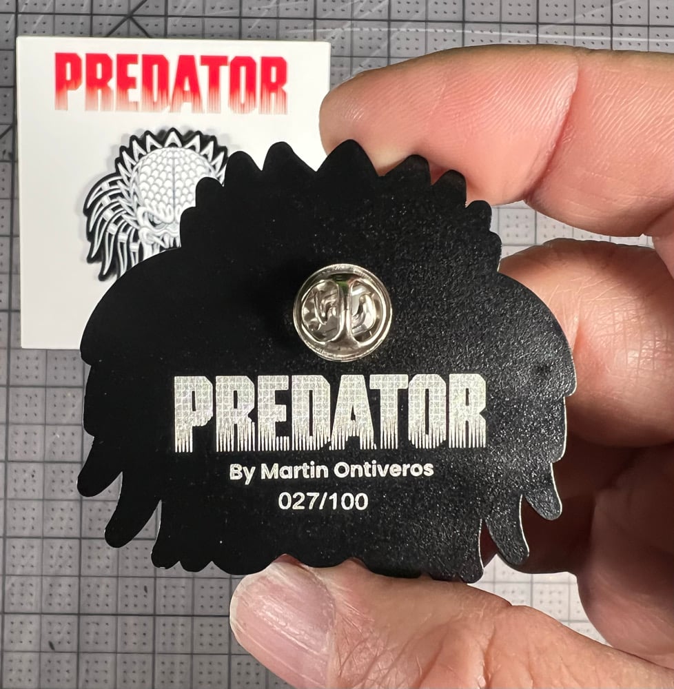 Predator enamel pin