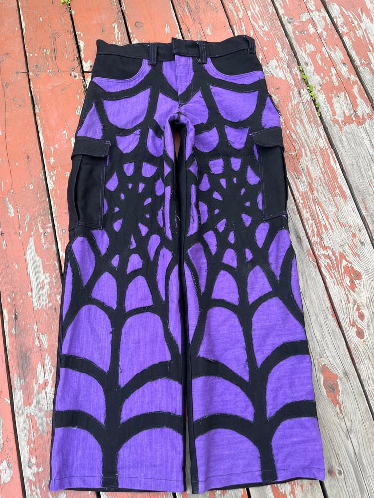 Image of spiderweb jeans 