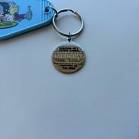 Image 3 of Space Outlaws Junkyard Keychain