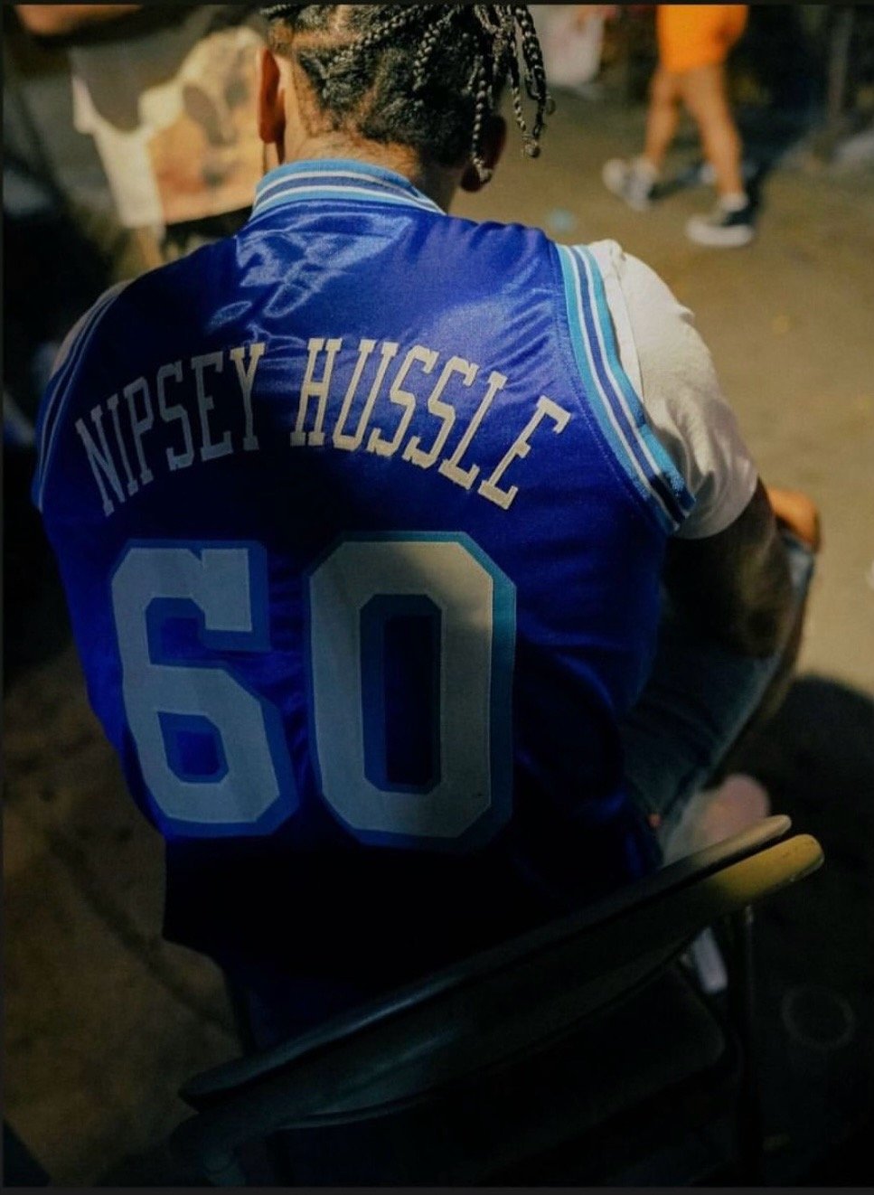 nipsey hussle wearing lakers jersey