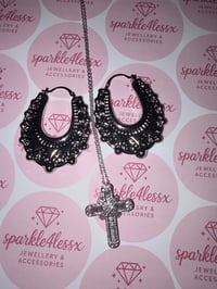 Large creoles and cross sliver 