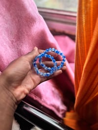 Image 1 of Blue