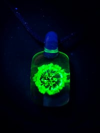 Image 2 of Uv reactive flower pendant 🌼
