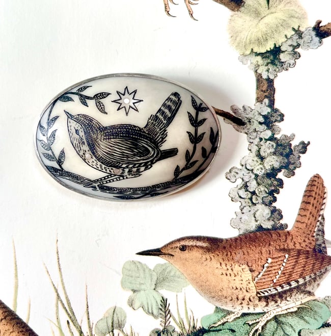 WREN WITH STAR BROOCH