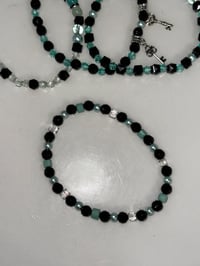 Image 5 of Teal and Black Midnight Glitz’s Tumbler Bracelet Stack