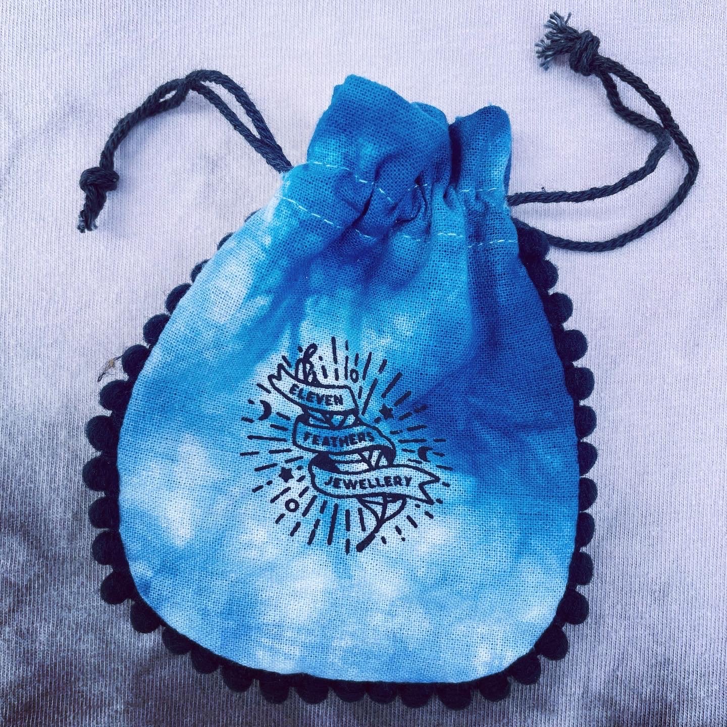 Image of Om/Aum &amp; Lotus flower charm necklace. Handmade silver charm, waxed hemp cord adjustable pendant.