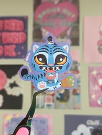 Image 3 of derpy tiger die cut sticker.