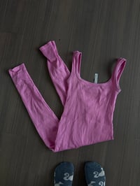 pink fitted one piece (sz med)