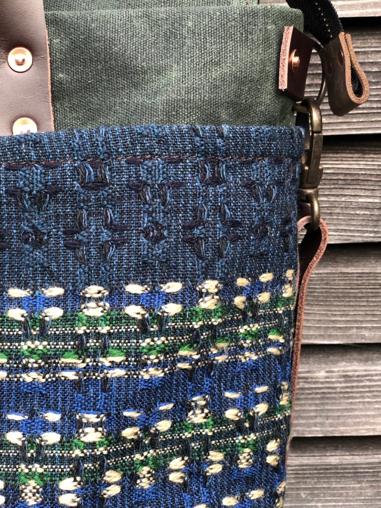 Image of  Waxed canvas carryall with handwoven exterior pocket in forest green