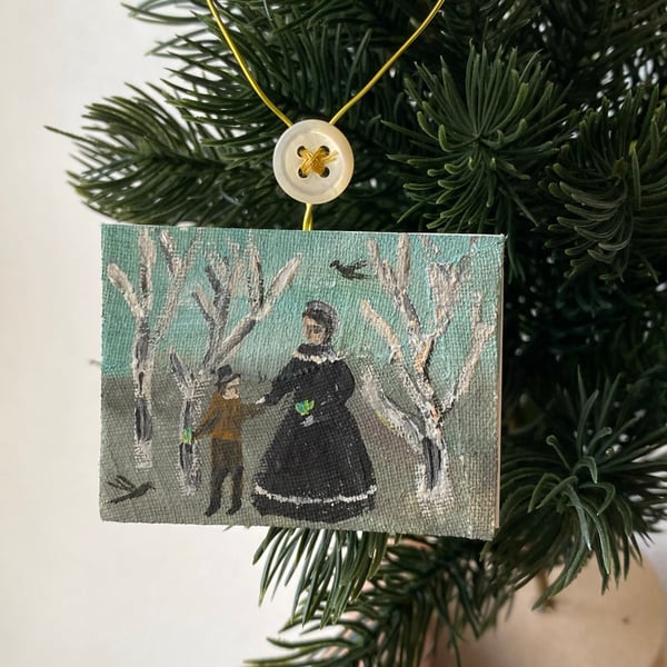 Image of Lady and boy collecting evergreen sprigs