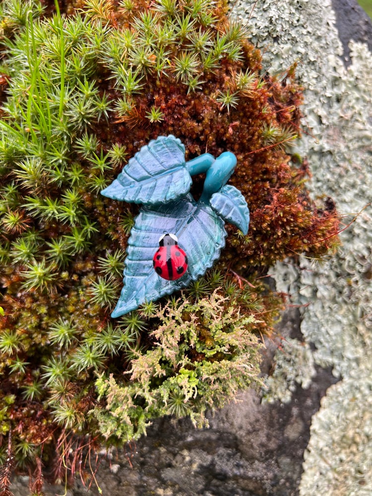 Image of Liquid Blue Triple Leaf & Ladybug Pendant