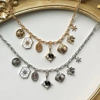 Image 1 of SEVEN COURTS CHARM