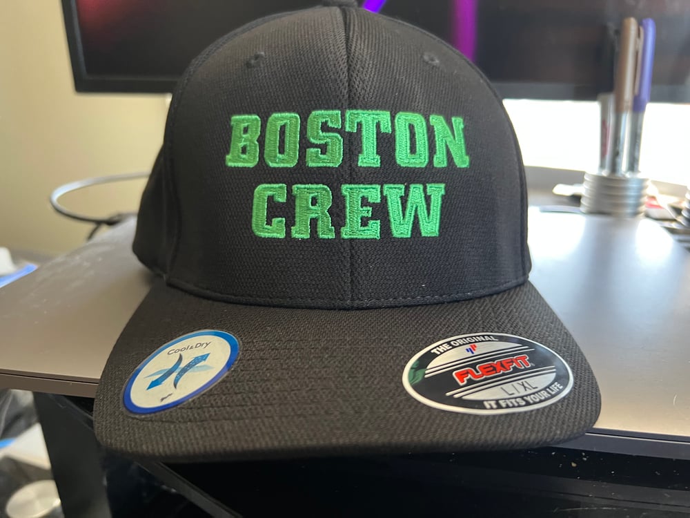 Black Flexfit hat with Green “Boston Crew" Logo