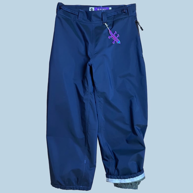 Image of NAVY EXTRA-BAGGY TECH LIZARD PANTS