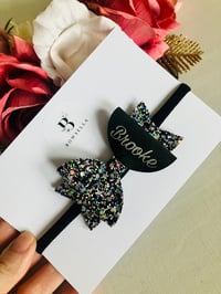 Black and silver pesonalised bow 