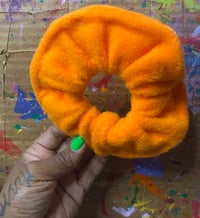 Image 2 of orange fluff