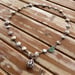 Image of Hawaiian puka shell wrap necklace with Hebrew cone clasp