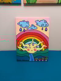 Image 2 of There's always rain, before a rainbow.