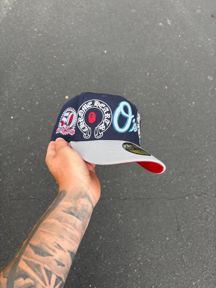 Image of MULTI TONE NAVY GREY BALTIMORE ORIOLES CUSTOM FITTED CAP