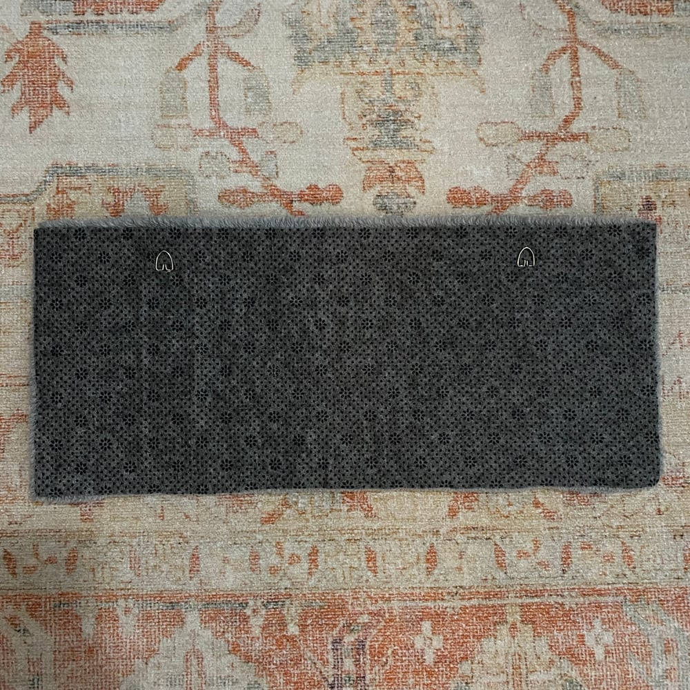 Image of folklore title wall rug