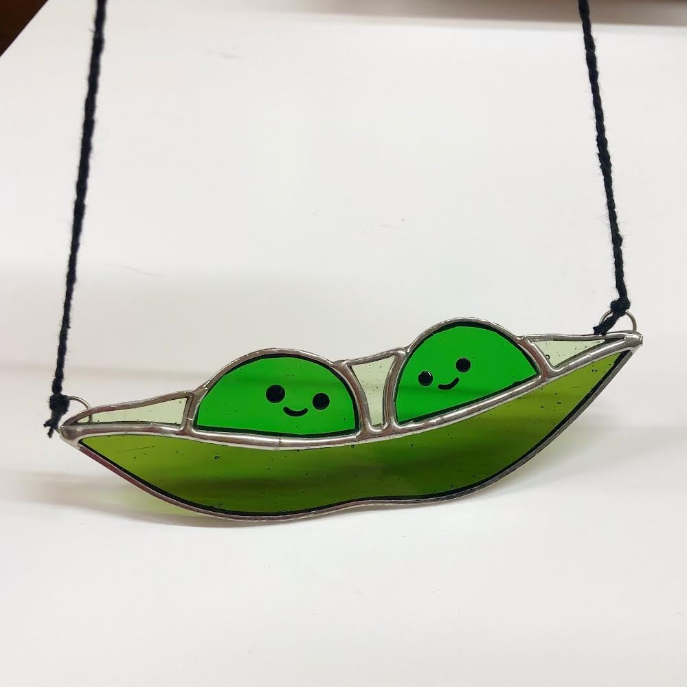 Barkbox peas in a sales pod