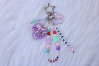 Image 2 of 'love cherry motion' LOONA keychain