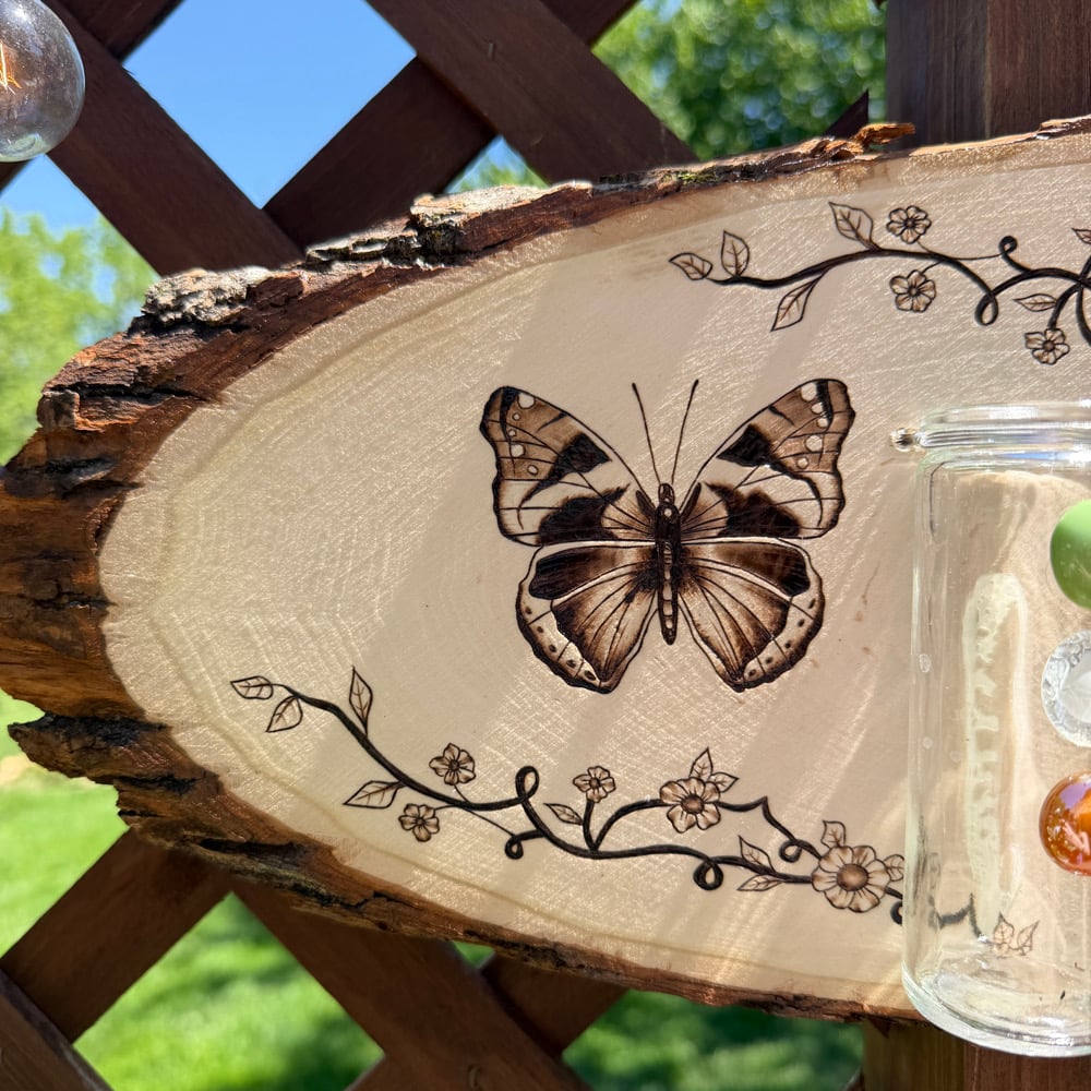 Image of trinity in the crest propagation wood art