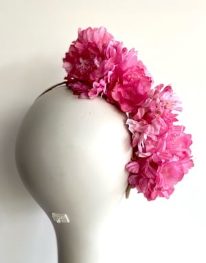 Image of Rose pink flower headpiece. 