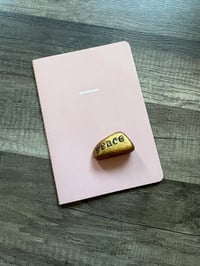 Note book & paper weight 