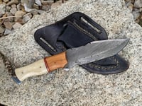 Image 1 of 512 layer Damascus knife with cross body sheath.