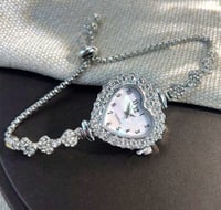 Image 1 of Time Is An Illusion 