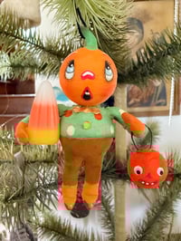 Frightened Goblin with Jack O' Lantern and Candy Corn