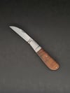 Hollow grind swayback wharncliffe