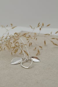 Image 2 of Triple-Leaf Family Pendant in Recycled Silver – Customisable Fold Collection Necklace