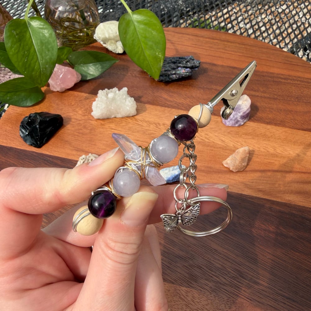 Image of purple pupa clip keychain
