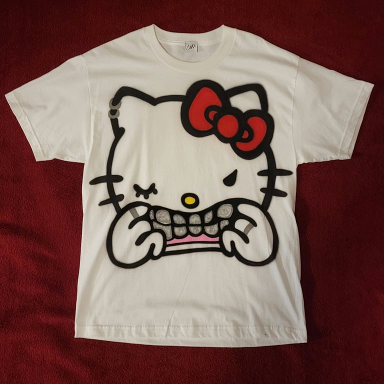 Kitty Grillz (L)