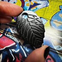 Image 1 of DMG’s Obsidian Leaf