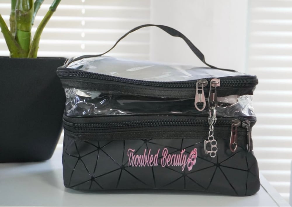 Image of Troubled Travel Makeup Bag