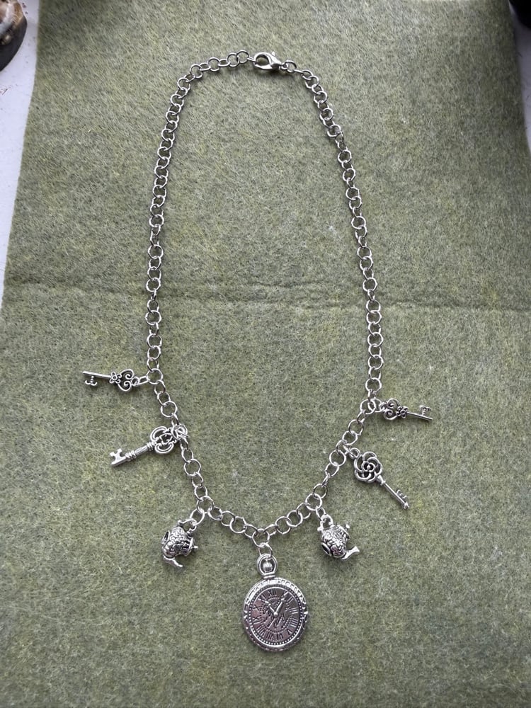 Image of Alice in wonderland inspired necklace ❣️🕰️🫖🐇