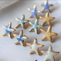 Image 1 of Pendientes Estrellas pequeños 