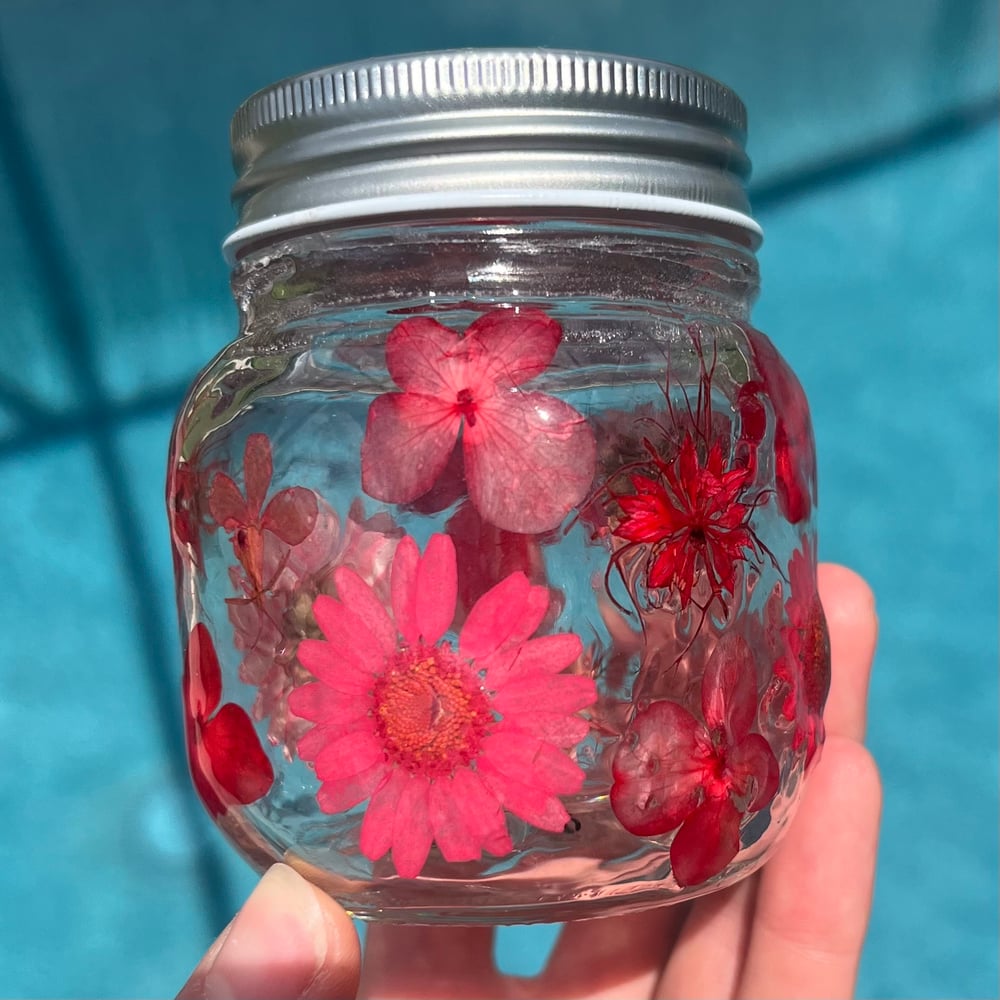 Image of red flower jar