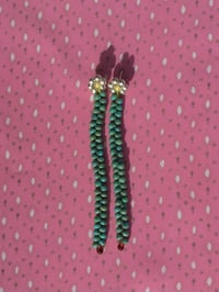 Image 1 of Daisies connected