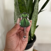 Laulau Badge Reel