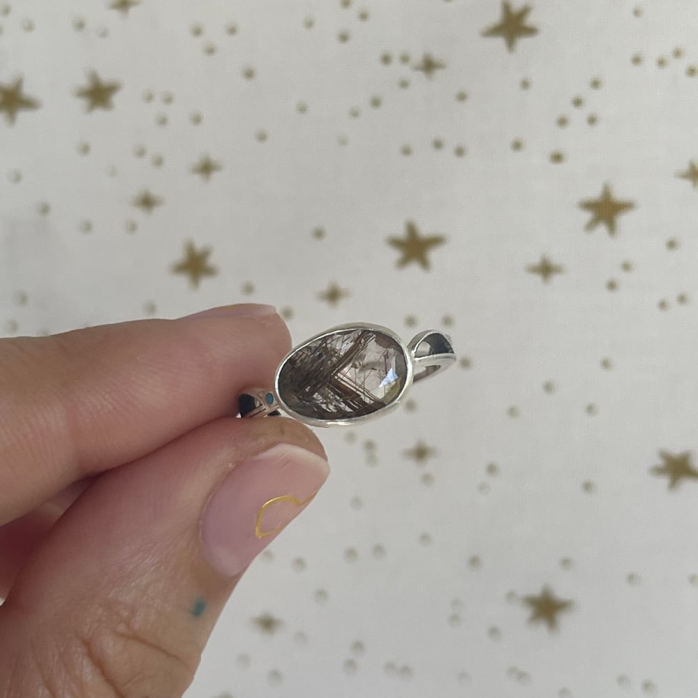 Image of gold hair ring